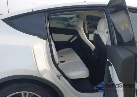 2021 Tesla Model Y Standard Range Rear-Wheel Drive from USA, damaged, VIN 5YJYGDED7MF103408